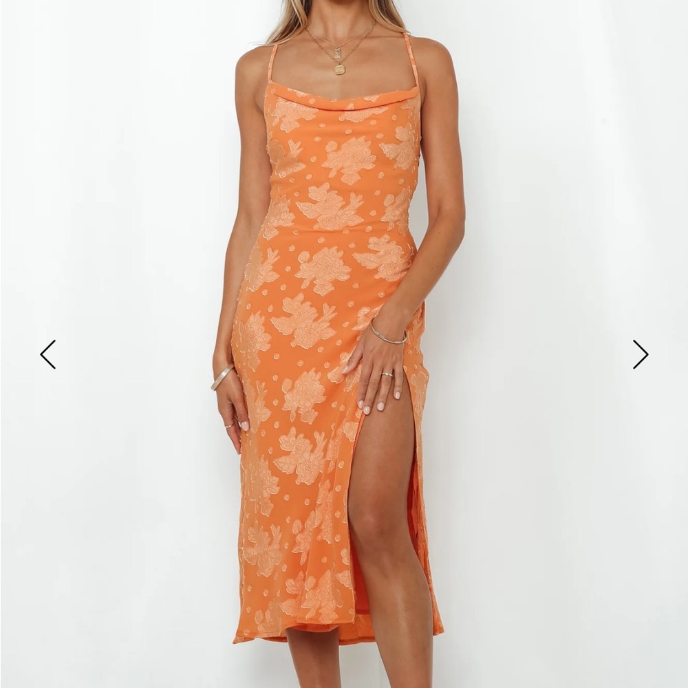 Orange floral midi dress with a split